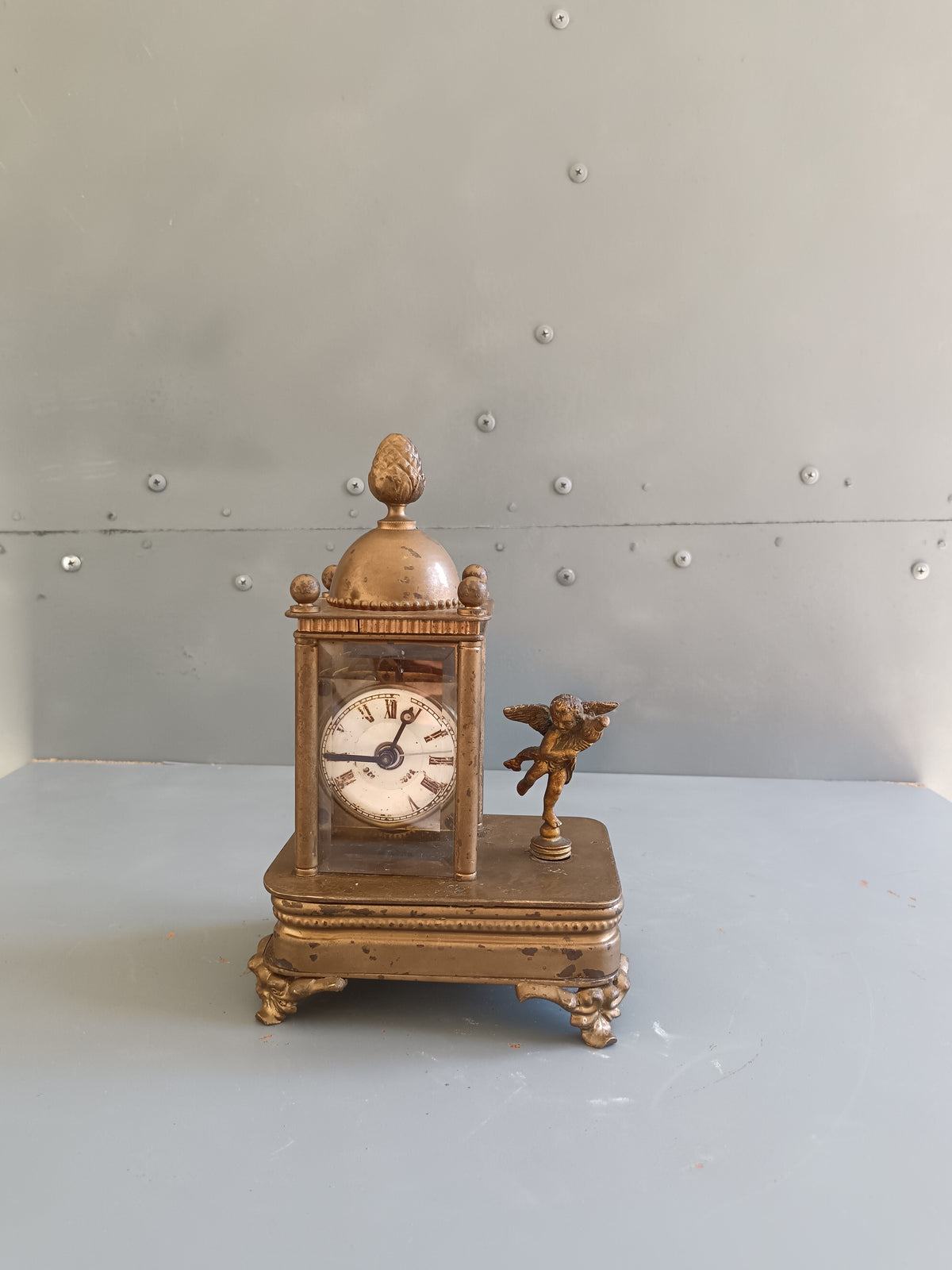 ANTICO OROLOGIO DA TAVOLO “CAPPUCCINA” / DA CARROZZA – PUTTO ALATO – FINE ‘800